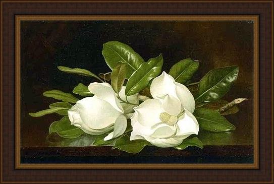 Framed Martin Johnson Heade magnolias on a wooden table painting